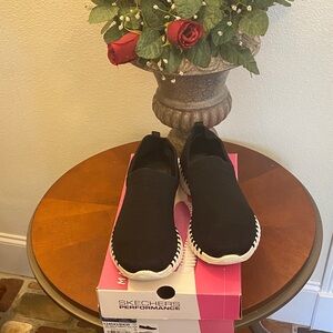 Skechers Black and White Slip-On Shoes